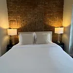 Gorgeous Exposed Brick 1 Bedroom Plus Private Roof Deck!